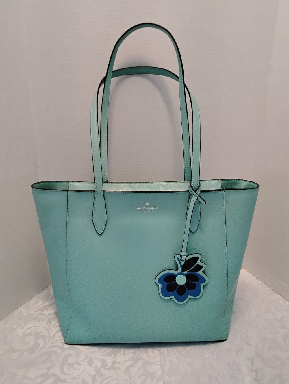 KATE SPADE NY DANA Aqua Bloom Pebbled Leather Tote with Leather Floral Charm